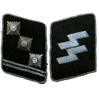 Comandante de las Waffen-SS con el rango de SS-Obersturmführer con lengüeta en el cuello. Espenlaub militaria