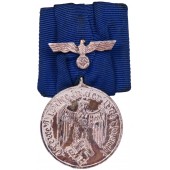 Медаль 4 года службы в вермахте на колодке. Интересный вариант