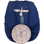 Медаль 4 года службы в вермахте на колодке. FR. Ackermann