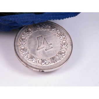 Médaille pour 4 ans du service dans le Wehrmacht sur le bar de Ackermann. Espenlaub militaria
