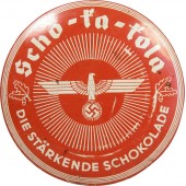 Schokoladendose der Wehrmacht mit einem Adler auf dem Deckel. Scho-ka-kola