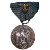 Médaille pour 4 ans de bons et loyaux services dans la Wehrmacht. Métal non magnétique