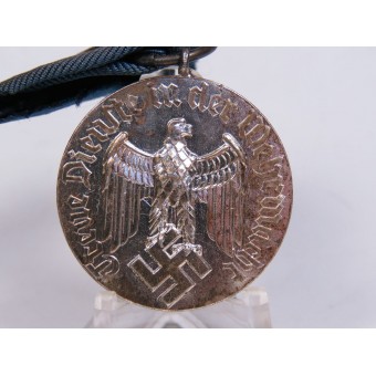 Medaille voor 4 jaar trouwe dienst in de Wehrmacht. Niet magnetisch metaal. Espenlaub militaria