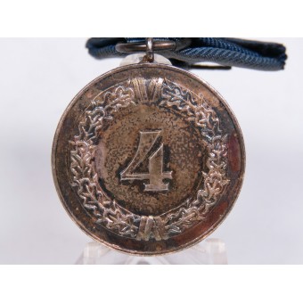 Médaille pendant 4 ans de service fidèle dans le Wehrmacht. Métal non magnétique. Espenlaub militaria