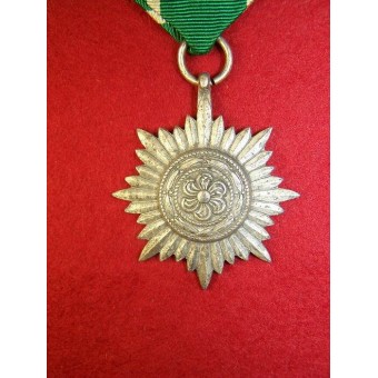 Decorazione Ostvolk (medaglia) al Merito senza spade in argento, 2a classe. Espenlaub militaria