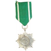 Ostvolkin kunniamerkki (mitali) ansioista ilman miekkoja, hopeaa, 2. luokka.