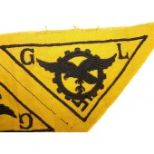 Luftwaffen teknisen henkilöstön rintakotka, jossa merkintä G.L.