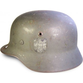 M 35 , Q 64 hjälm, efter 1940 års återutgivning, skadad i strid!. Espenlaub militaria