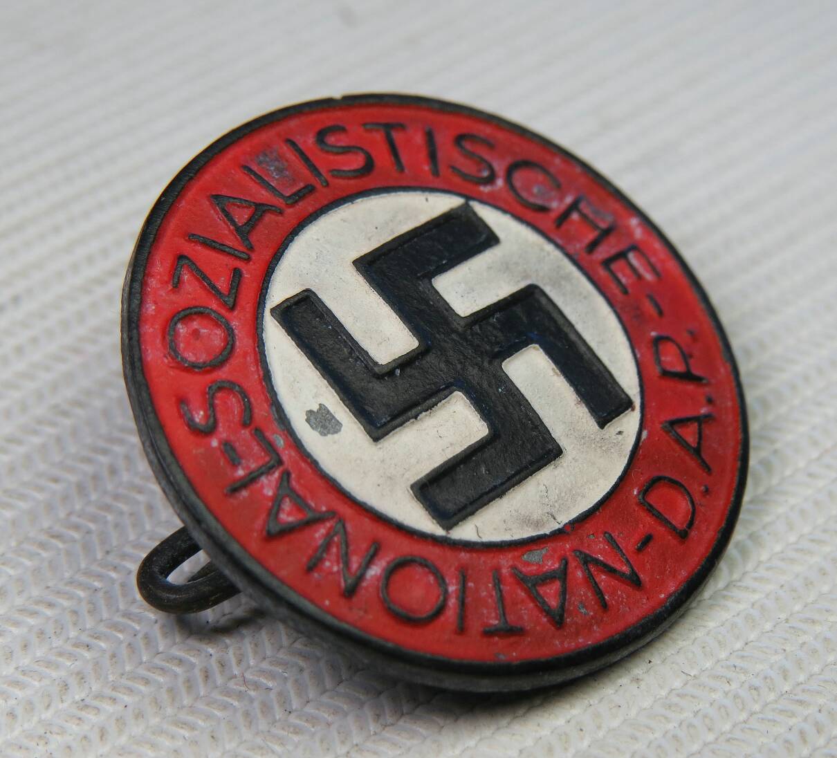 Near mint zinc М1/14 RZM NSDAP party member badge