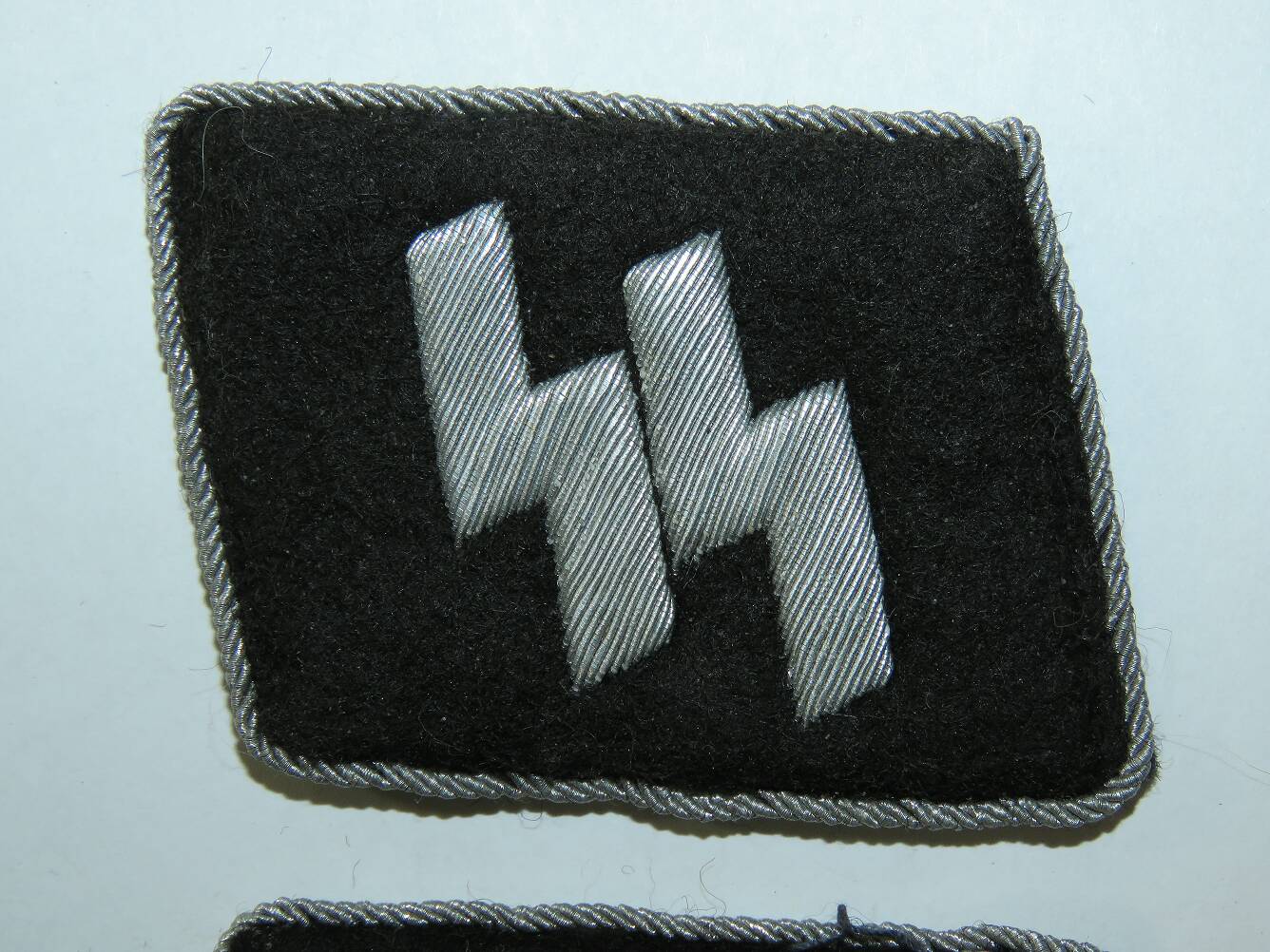 Waffen-SS commander with the rank of SS-Obersturmführer collar tabs