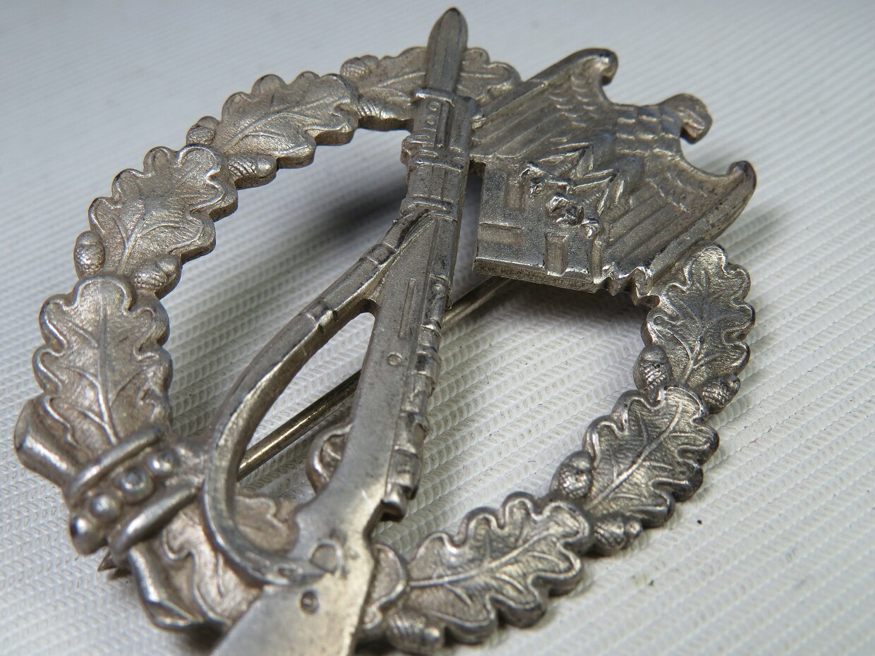 Infantry assault badge in silver, marked CW by Carl Wild